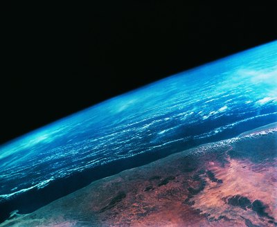 A satellite photo of a coastline on Earth.
