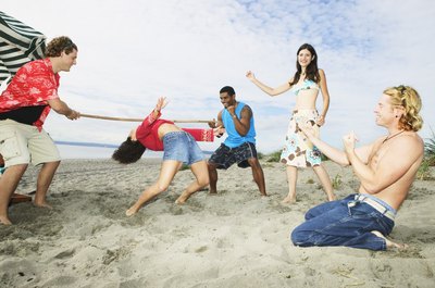 Friends having a limbo contest.