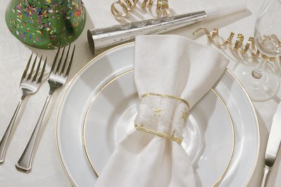 Golden rimmed plates add to the ambiance of the 50th celebration.