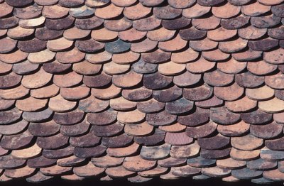 Roofing tiles overlap so that water cannot leak through a seam.