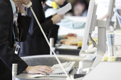 Airline worker on telephone