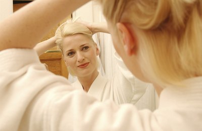 Pull your hair up and away from your face and neck.