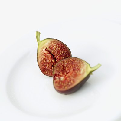 The cross-section of a fig on a plate.