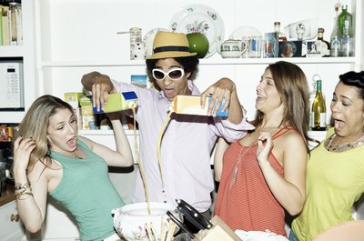 Friends are mixing cocktails.