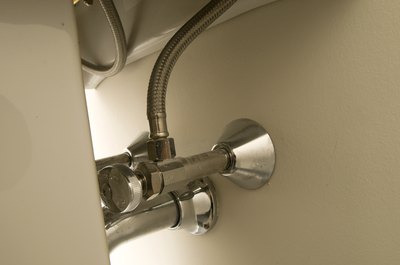 Bathroom pipes and valves.