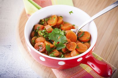 Bowl of cooked carrots
