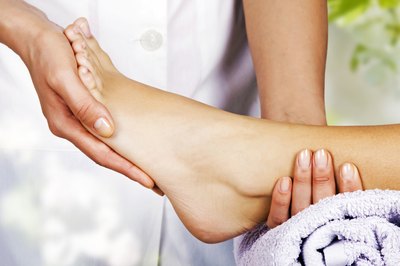 Saddle bone deformity is visually distinguished by the raised bump on the arch of the foot.