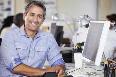 man sitting at editing bay