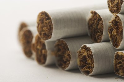 Close up of rolled cigarettes on table