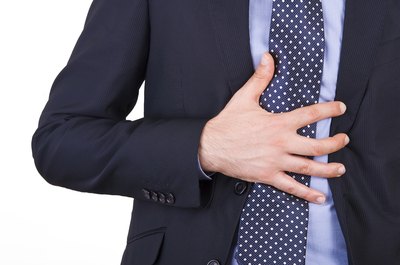 A man suffering from heartburn