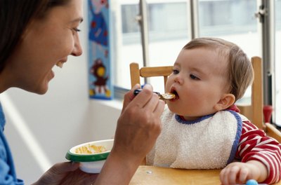 Mother feeding baby