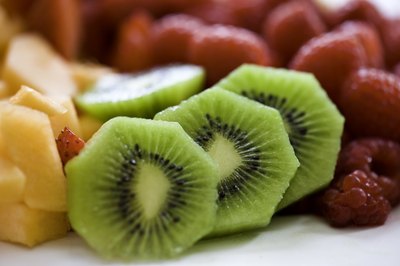 A plate with cut fruit.