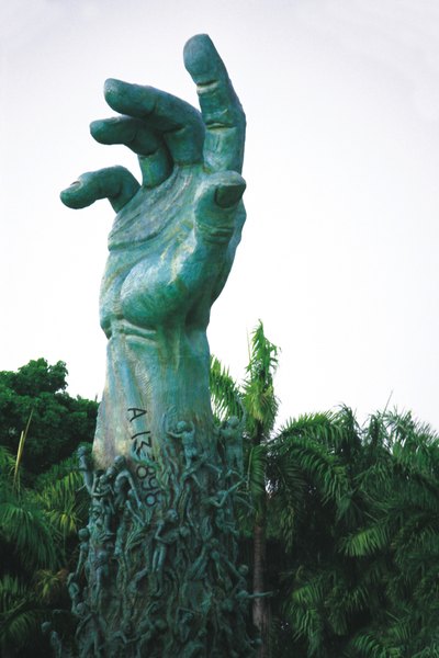 A green patina can form on a bronze sculpture over a long period of time.