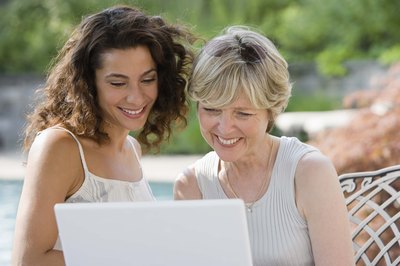 Mother and daughter on laptop