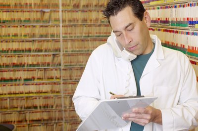 Medical billers and coders manage paperwork in medical offices.