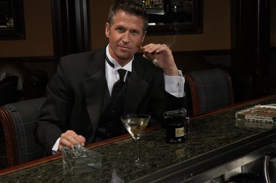 man at bar with cigar