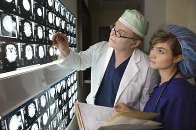 Doctors looking at MRI