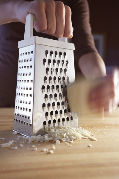 Cheese getting grated