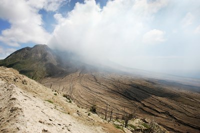 Steam and smoke rise from Soufriere Hills Volcano
