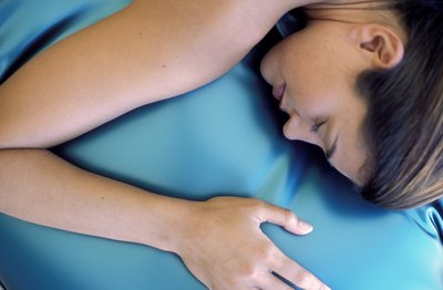 woman resting neck and arm