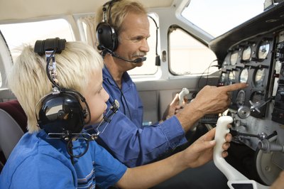 An airman certificate may be suspended or revoked for felony offenses such as airborne hunting (49 U.S.C. 44709) so you will not be able to fly your own plane to another country.