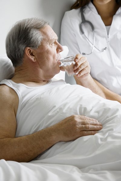 MAle patient drinking water