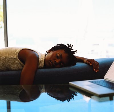 Sleepy woman on couch