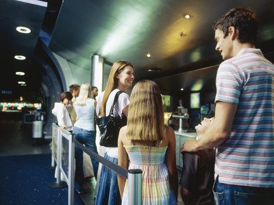 Parents taking kids to movie