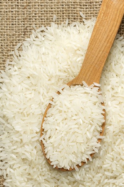 Spoon in uncooked rice