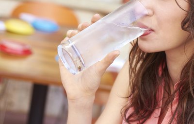 Woman taking supplements