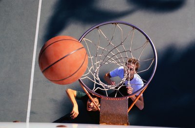 Boys playing basketball