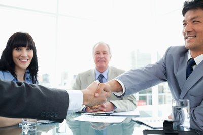 Business meeting hand shake