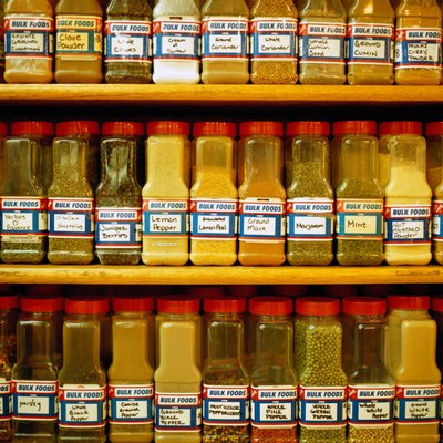 Bulk spices for sale at a market.
