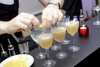 Bartender preparing cocktail drinks