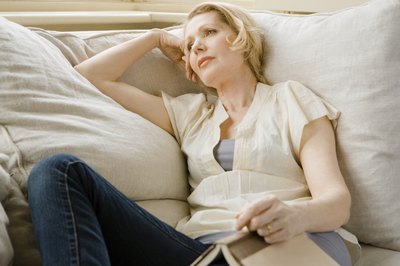 Woman thinking while relaxing.