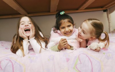 Young girls having a sleepover party