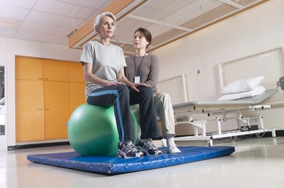 Woman with physical therapist