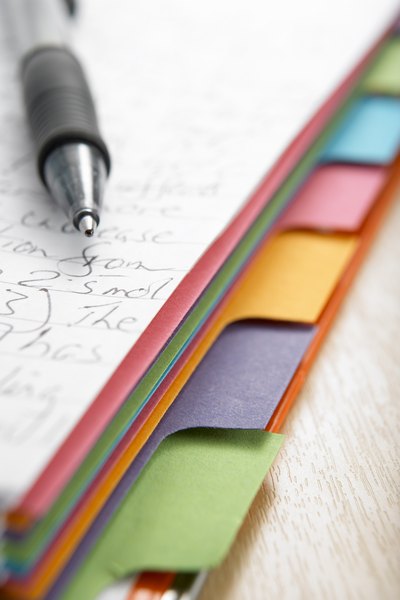 Tabbed notebook and pen