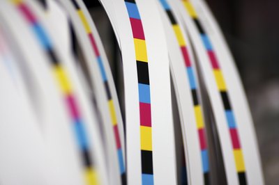 CMYK test strips near printing press
