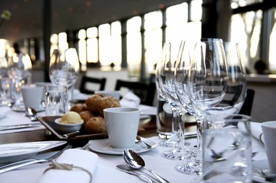 A banquet table is set and ready for guests.