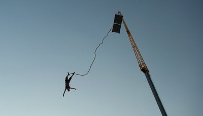 Man bungee jumping