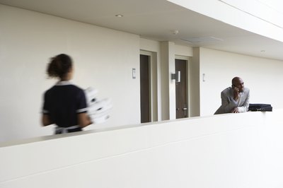 Housekeeper walking towards room