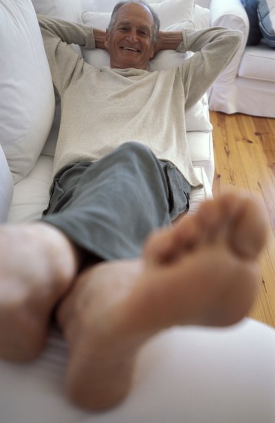 elderly man with his feet up