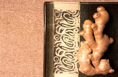Take ginger root tablets