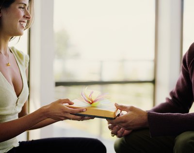 Man giving woman gift
