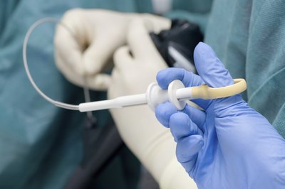 Doctors performing an upper gastrointestinal endoscopy.