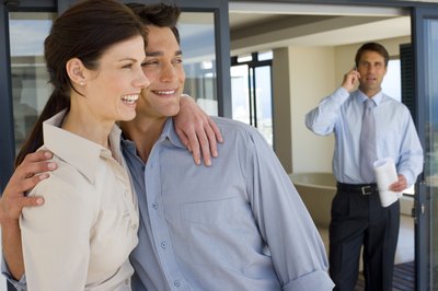 Real estate agent showing property