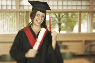 A female graduate wears a crimson sash and tassle.