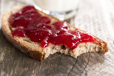 Toasted bread with jam spread on top