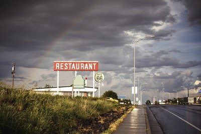 Large restaurant sign along highway